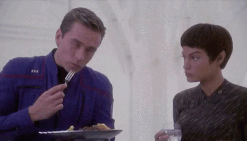 An animated gif of Commander Tucker eating.