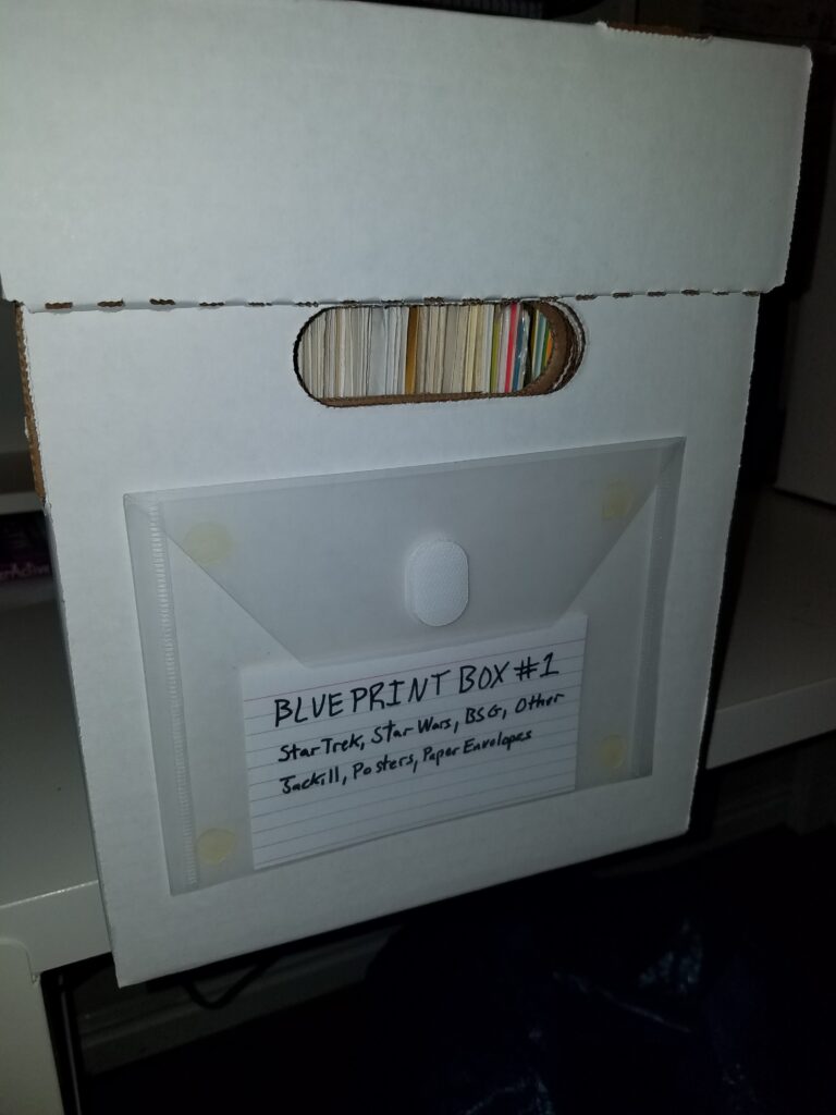 Storage envelope in use on a magazine short box.